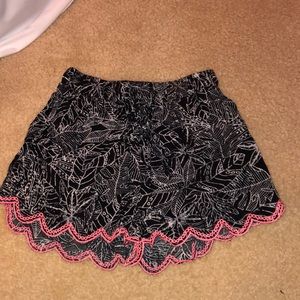 Black, white, and pink shorts.